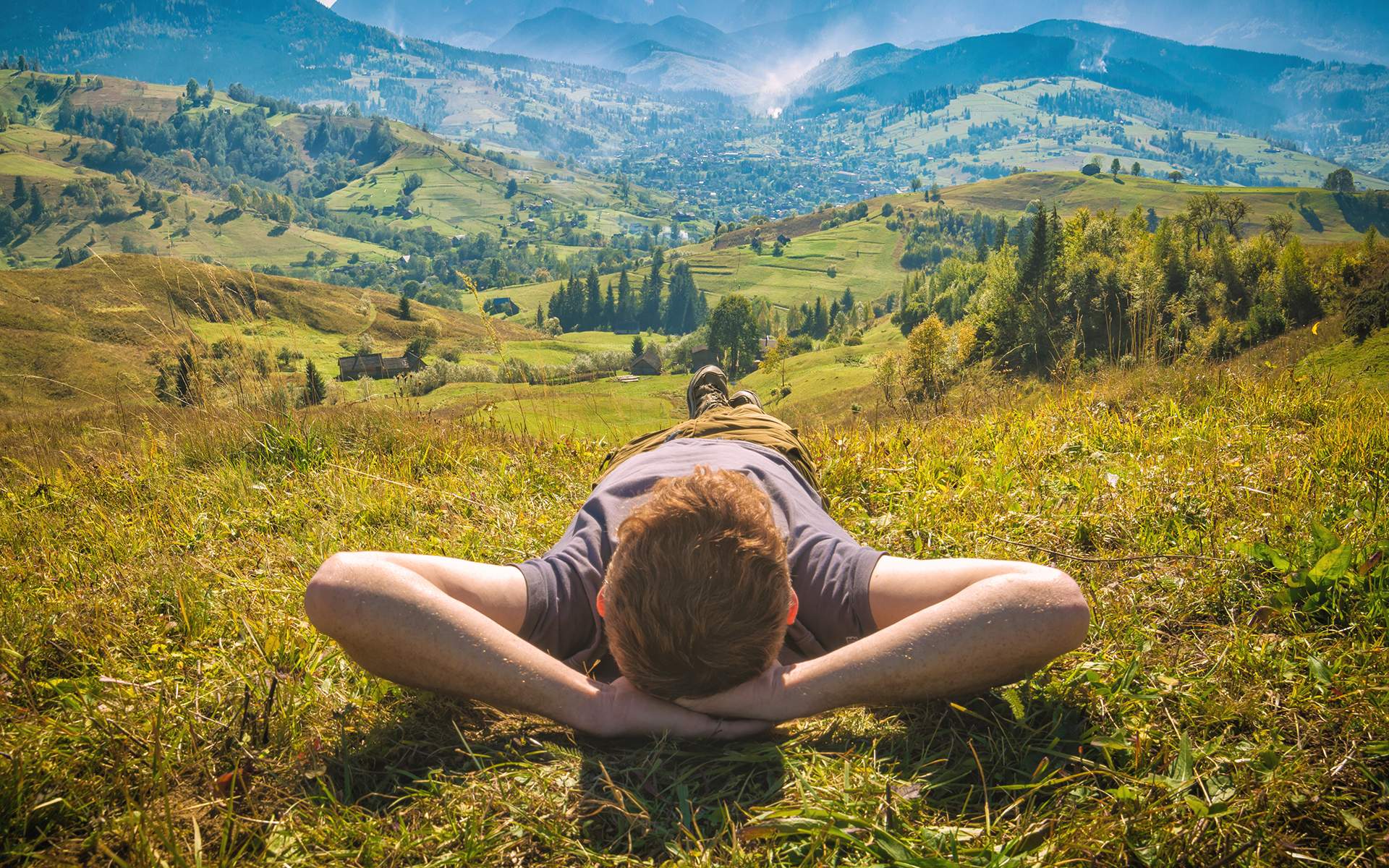 Summer Meditation Retreat: 6 Mindfulness 168期福彩全国数据查询入口 for Self-Care - Young red hair man lying on a hill